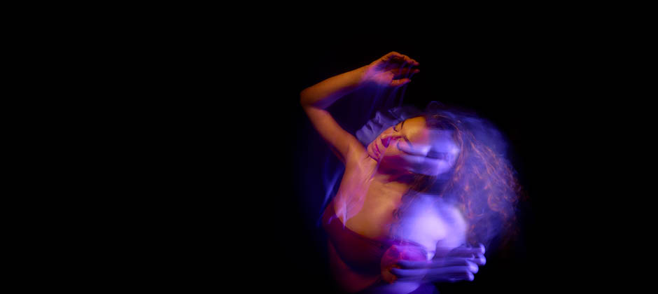 Ethereal motion-blurred portrait in deep purple hues, promoting Conversations After Sex at Park Theatre—a bold theatrical experience.