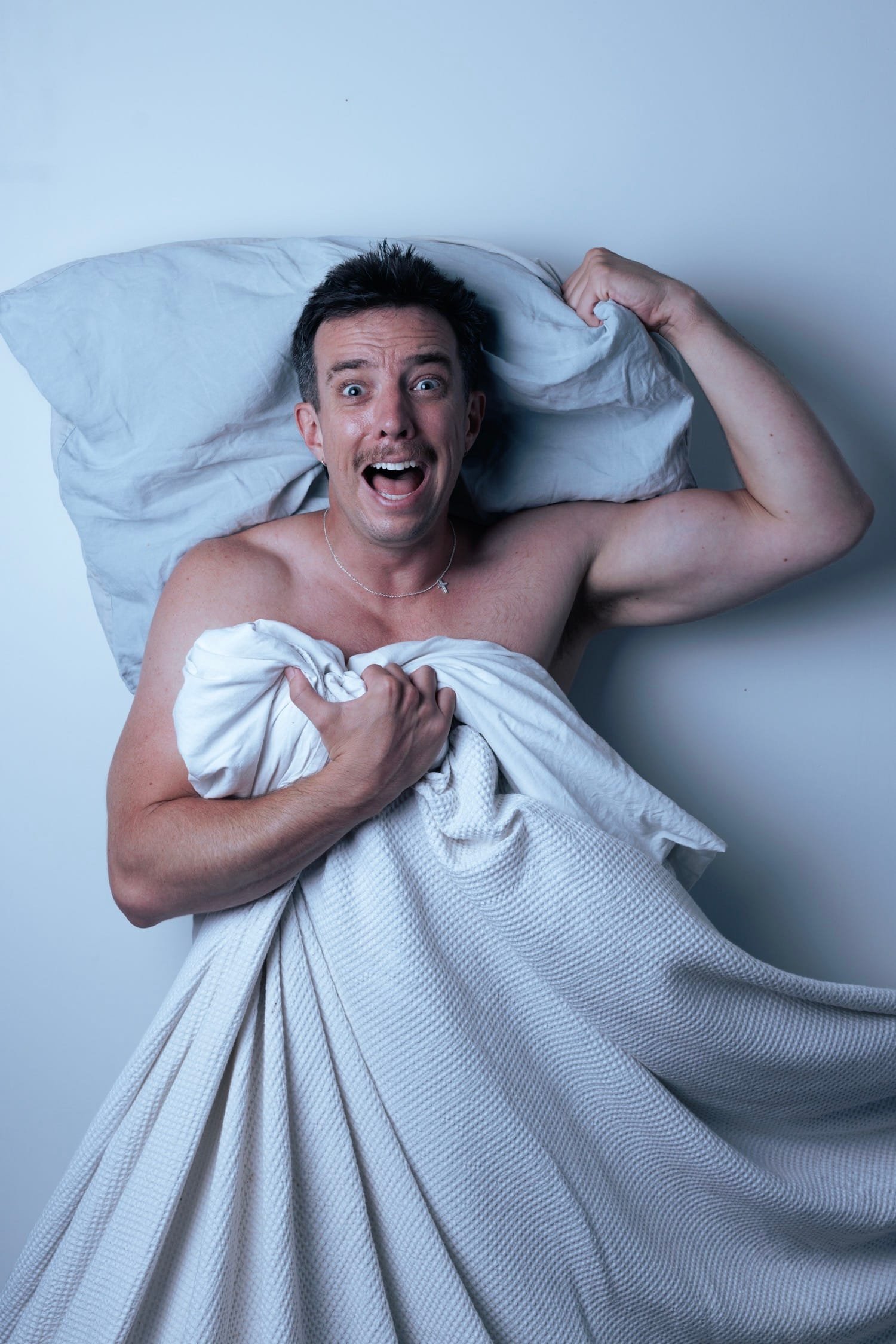 Eli Matthewson Turns Trauma Into Fringe Gold in Night Terror 7 Close-up of Eli Matthewson on stage mid-comedy set