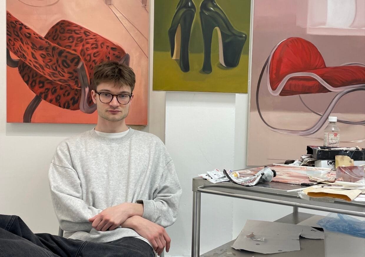Ollie White on Turning Everyday Objects Into Psychological Spaces 6 Ollie White standing beside his paintings at Something Borrowed exhibition
