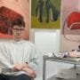 Ollie White on Turning Everyday Objects Into Psychological Spaces 2 Ollie White standing beside his paintings at Something Borrowed exhibition