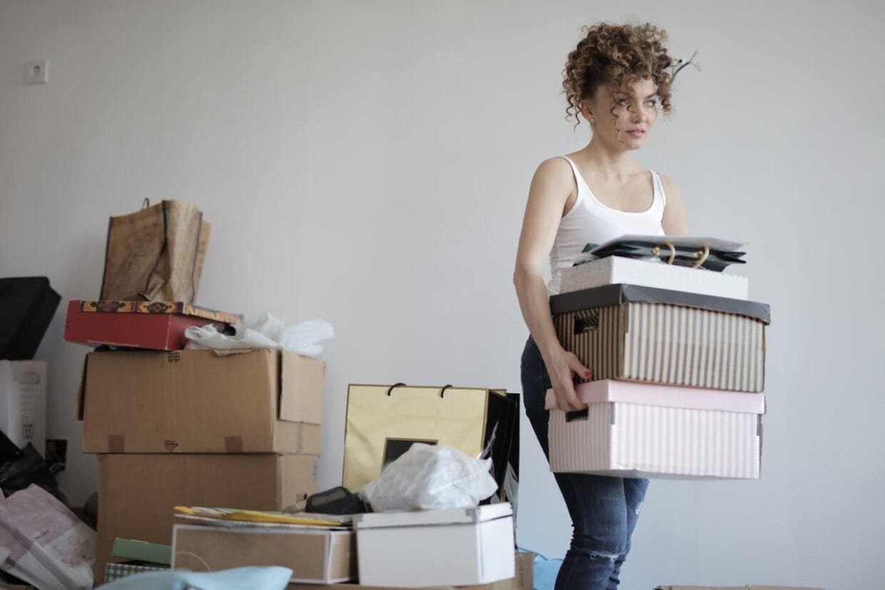 Smart Moves: How Innovation is Changing the Home Removal Game 6 girl moving boxes for removal company
