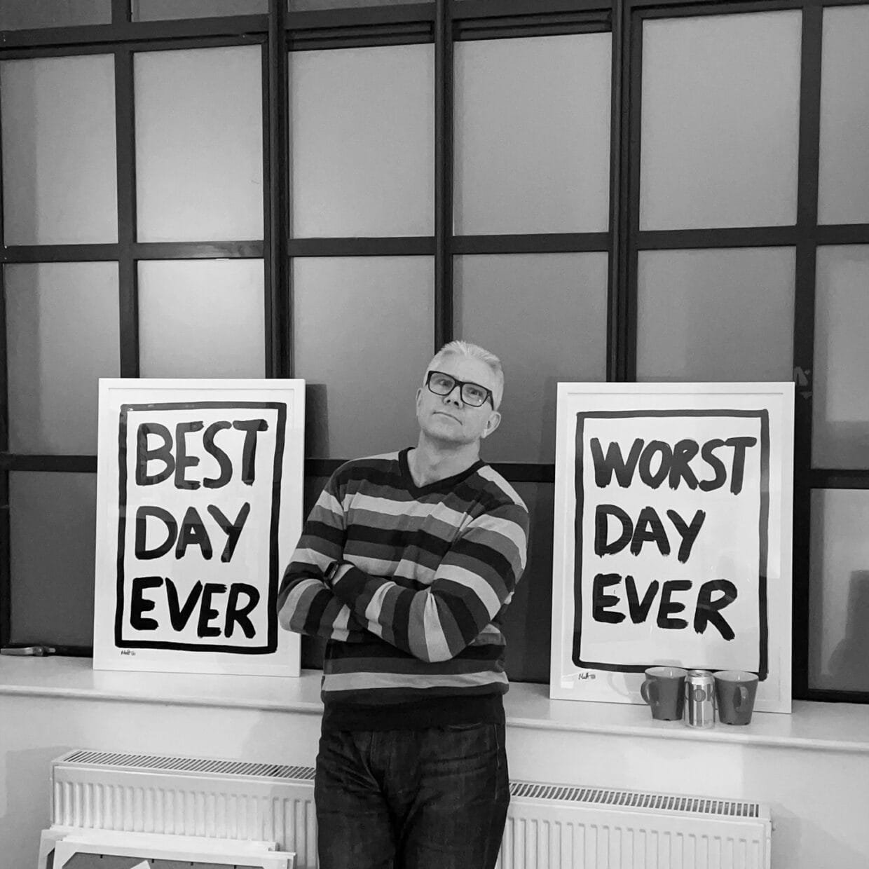 Matt Eley Explores the Power of Words in Art 6 Matt Eley in his London studio surrounded by typographic paintings