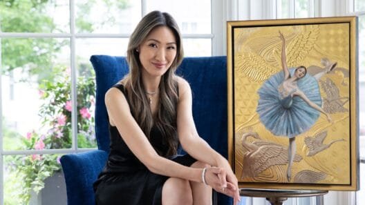 Shirley Yang sitting in her studio