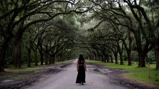 lack dress styled with bold accessories for a glamorous evening outfit