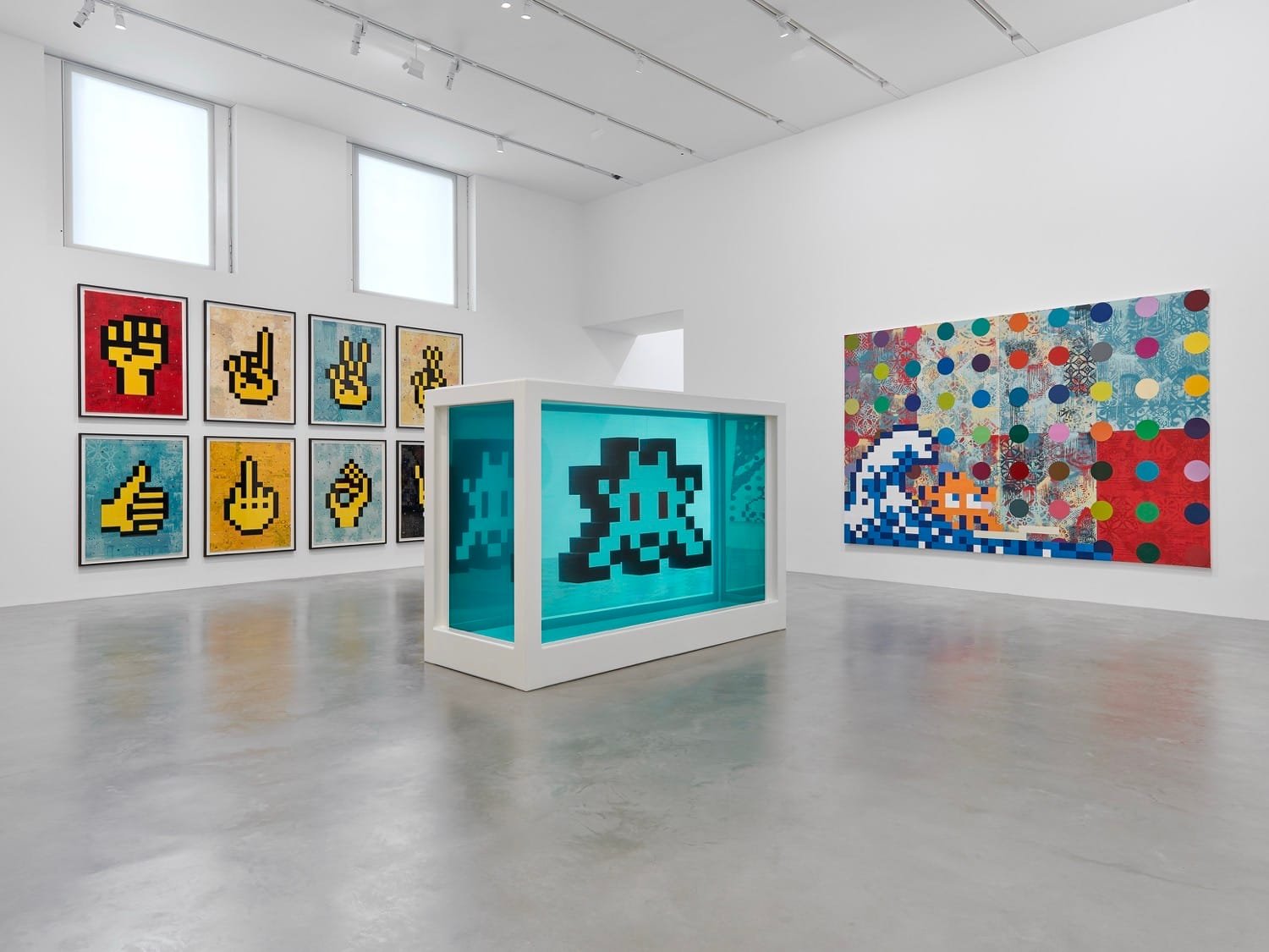 Triple Trouble Explodes at Newport Street Gallery: A Collision of Icons - Shepard Fairey, Damien Hirst, and Invader 8 Close-up of Invader’s mosaic piece in the Triple Trouble show