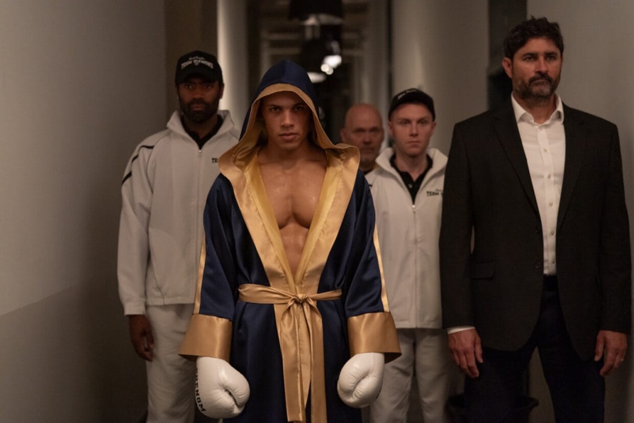 Christopher M. Anthony on set discussing a scene from HEAVYWEIGHT