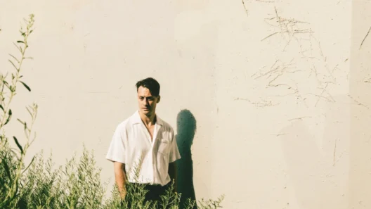 Portrait of Olovson promoting his new single release