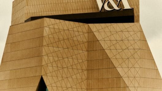 Exterior of the new V&A East Museum building on East Bank with visitors approaching the entrance at Queen Elizabeth Olympic Park.