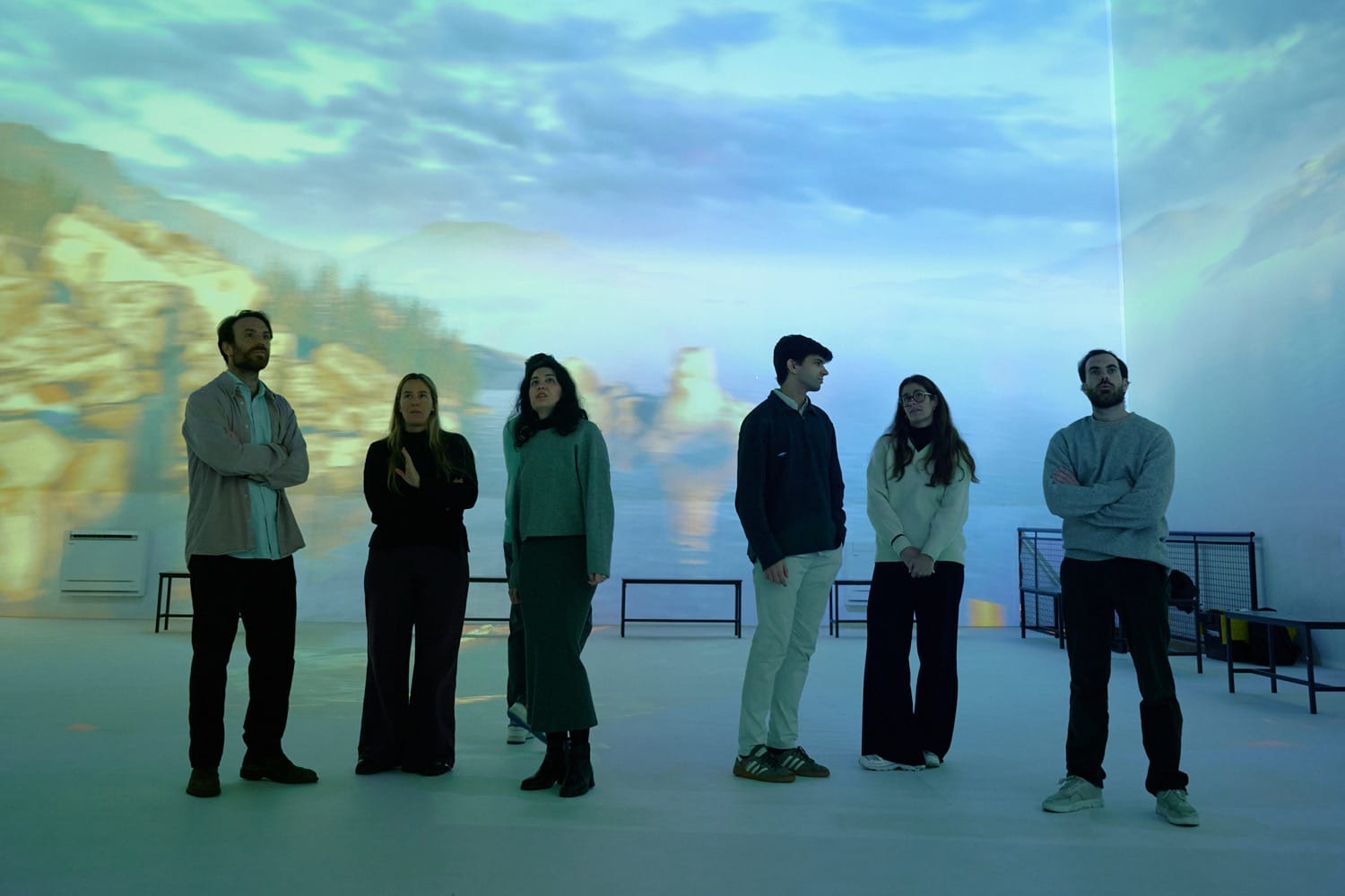 Visitors engaging with interactive installations at the immersive experience.