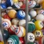 Bingo balls inside a wire drum