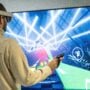 Person playing a game in a virtual reality headset