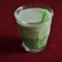 A cup of matcha bubble tea with tapioca pearls