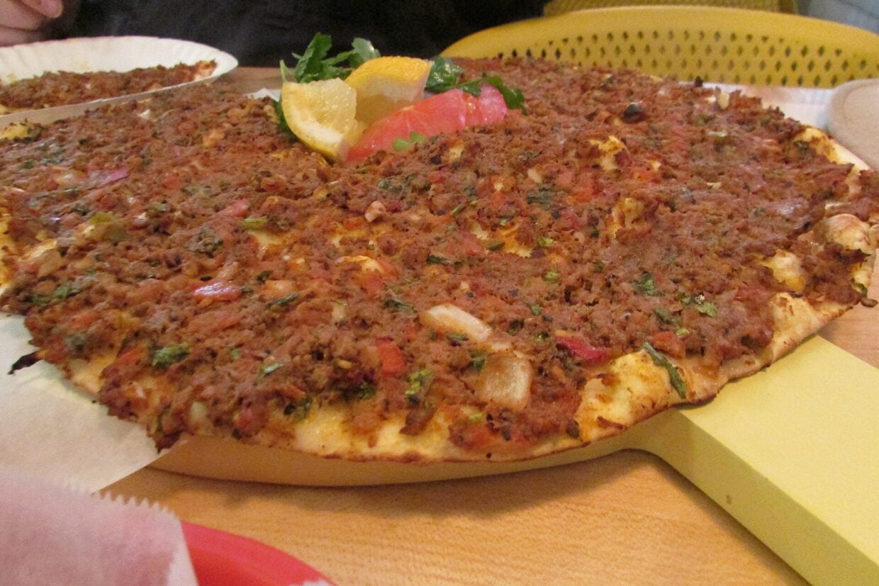 Lahmacun Turkish flatbread on a plate