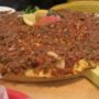 Lahmacun Turkish flatbread on a plate