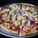 Hawaiian pizza with ham and pineapple