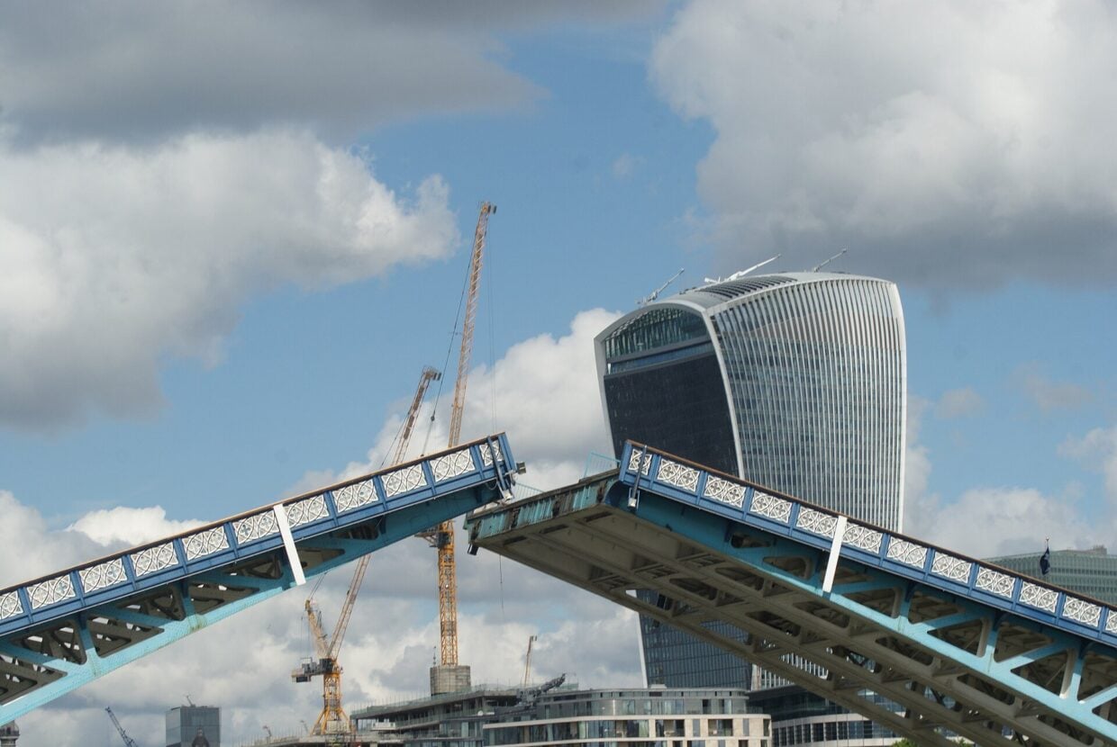 Tower Bridge bascules raised over the Thames