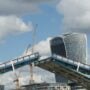 Tower Bridge bascules raised over the Thames