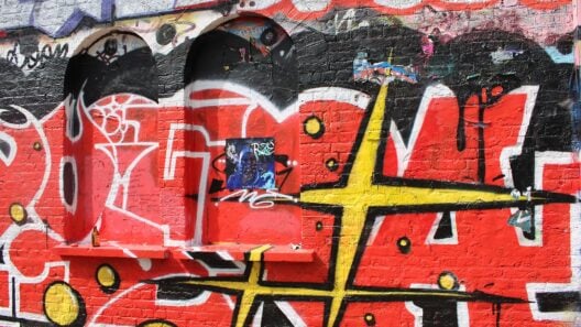 View of street art on the front of Shoreditch tube station on Pedley Street - geograph.org.uk - 7828536